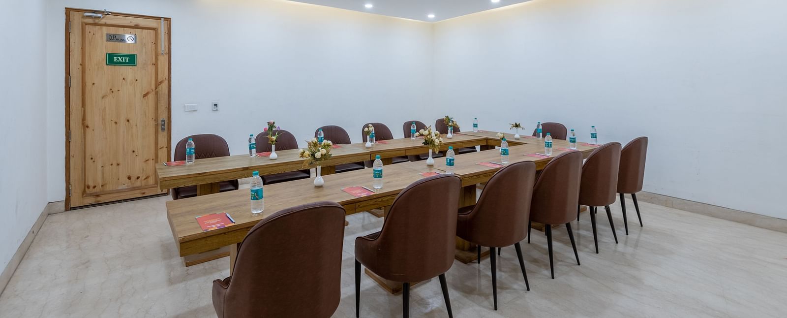 Spacious conference room with multiple chairs arranged for a meeting or event at DLS The Classio